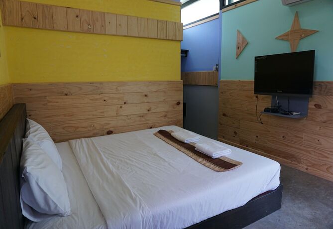 Imagen de la habitación del Hotel The Lampang Villa. Foto 18