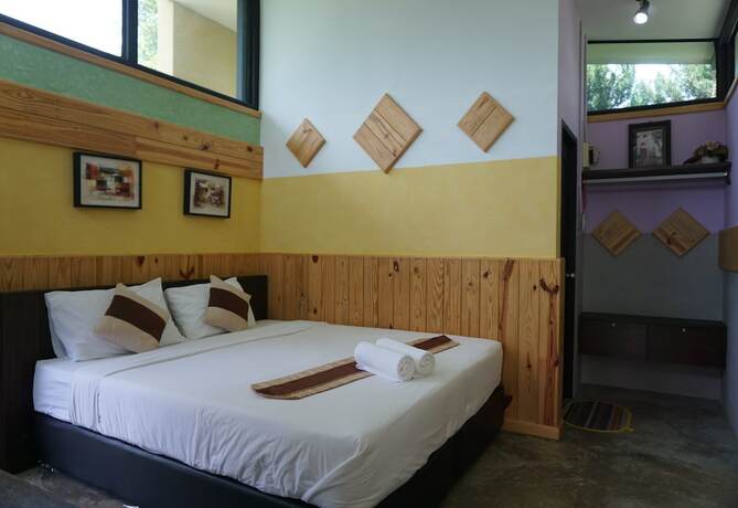 Imagen de la habitación del Hotel The Lampang Villa. Foto 19