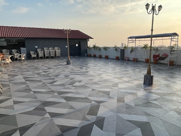 Imagen de la habitación del Hotel The Landmark, Chhatarpur. Foto 11