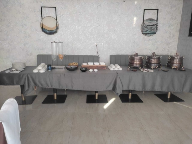 Imagen del bar/restaurante del Hotel The Landmark, Chhatarpur. Foto 6