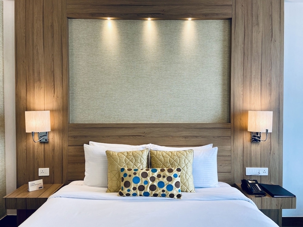 Imagen de la habitación del Hotel The Landmark, Kanpur. Foto 9