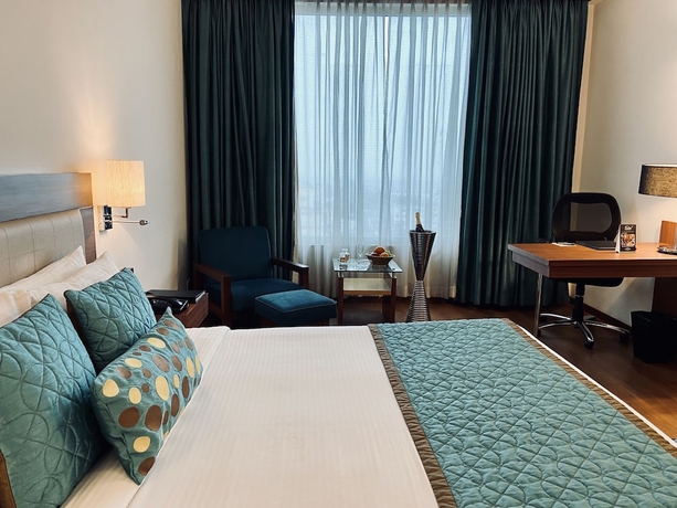 Imagen de la habitación del Hotel The Landmark, Kanpur. Foto 10