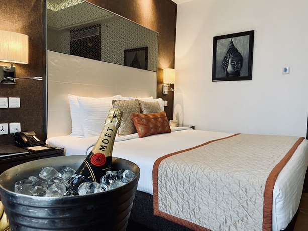 Imagen de la habitación del Hotel The Landmark, Kanpur. Foto 12
