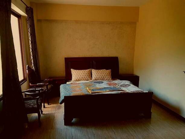 Imagen de la habitación del Hotel The Landmark, Nārān. Foto 19