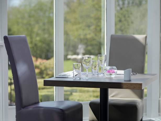 Imagen del bar/restaurante del Hotel The Landmark and Leisure Club. Foto 4