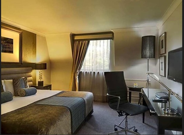 Imagen de la habitación del Hotel The Landmark and Leisure Club. Foto 2