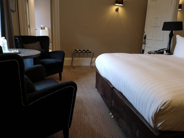 Imagen de la habitación del Hotel The Landmark and Leisure Club. Foto 17