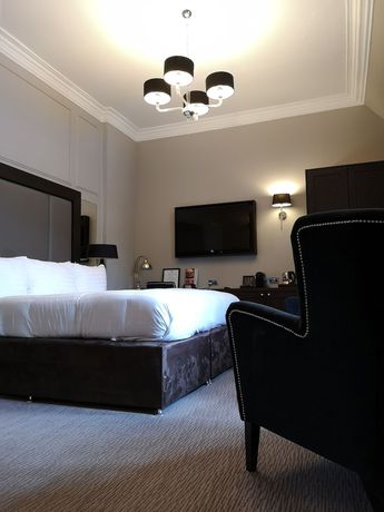 Imagen de la habitación del Hotel The Landmark and Leisure Club. Foto 18