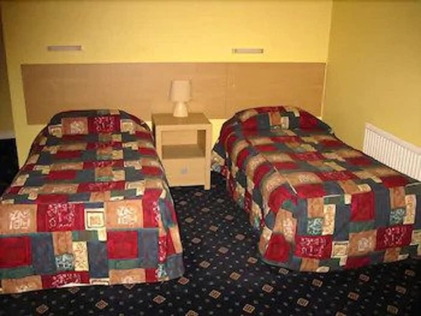 Imagen de la habitación del Hotel The Langham. Foto 11