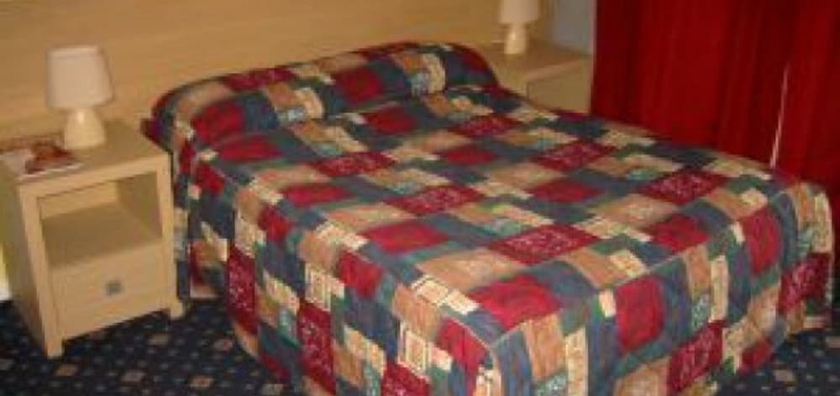 Imagen de la habitación del Hotel The Langham. Foto 12