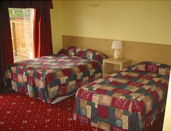 Imagen de la habitación del Hotel The Langham. Foto 14