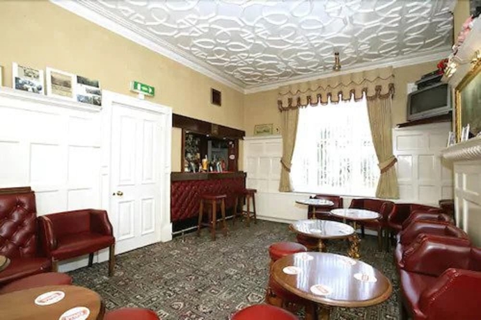 Imagen del bar/restaurante del Hotel The Langham. Foto 7