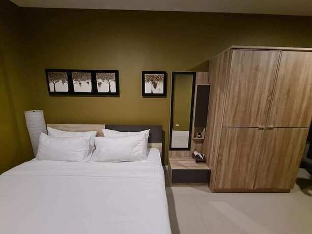 Imagen de la habitación del Hotel The Lantern Suites. Foto 17