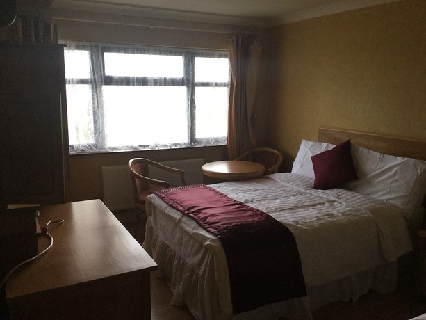 Imagen de la habitación del Hotel The Lanterns. Foto 12