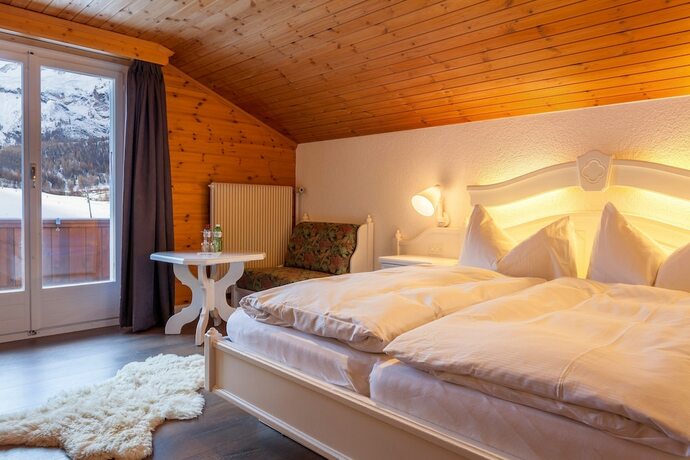 Imagen de la habitación del Hotel The Larix, Saas-Fee. Foto 12