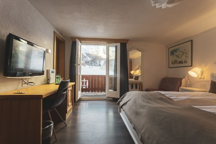 Imagen de la habitación del Hotel The Larix, Saas-Fee. Foto 13