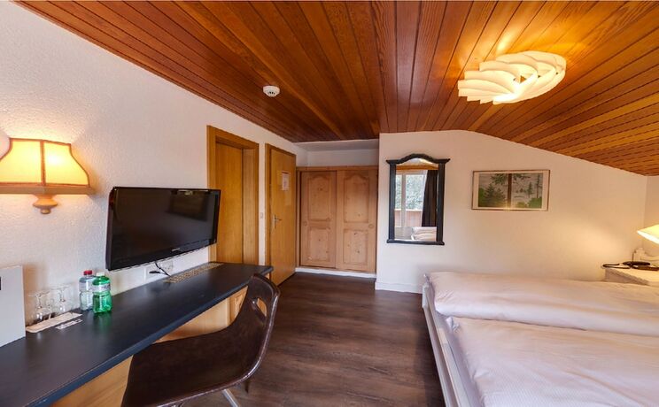 Imagen de la habitación del Hotel The Larix, Saas-Fee. Foto 15