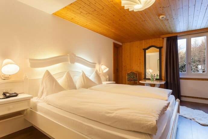 Imagen de la habitación del Hotel The Larix, Saas-Fee. Foto 17