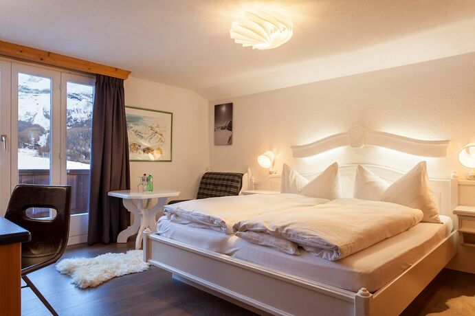 Imagen de la habitación del Hotel The Larix, Saas-Fee. Foto 19