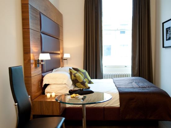 Imagen de la habitación del Hotel The Laslett. Foto 12