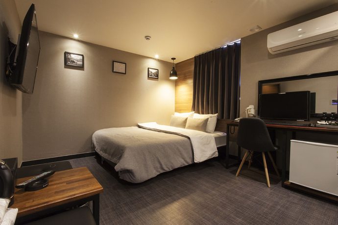 Imagen de la habitación del Hotel The Last. Foto 16