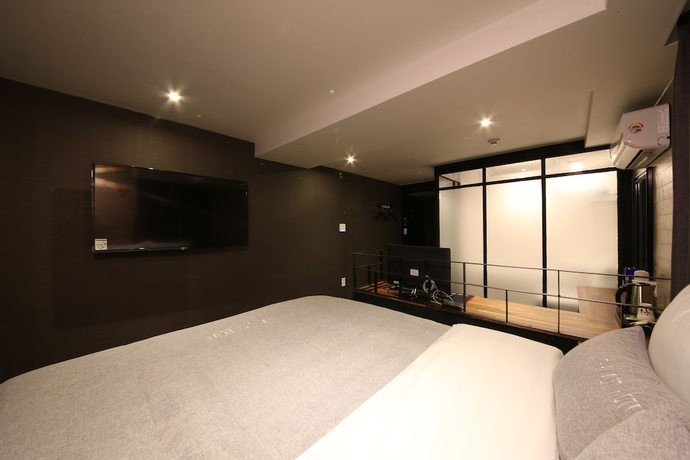 Imagen de la habitación del Hotel The Last. Foto 18