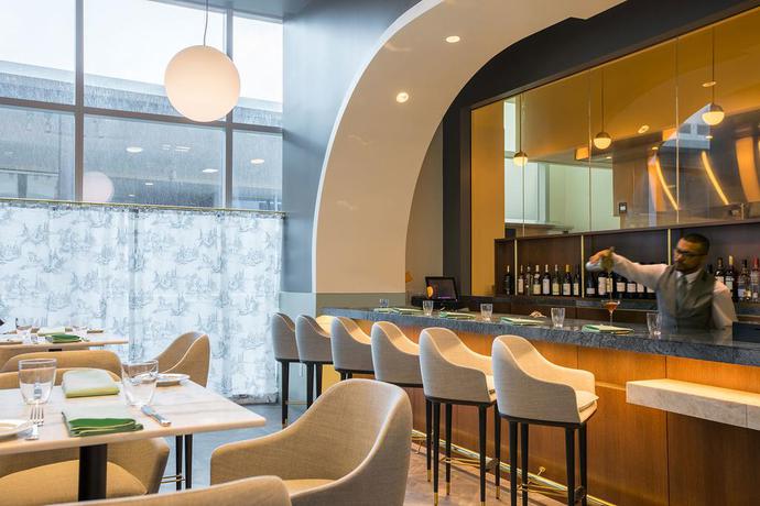 Imagen del bar/restaurante del Hotel The Laura Hotel, Houston Downtown, Autograph Collection. Foto 4