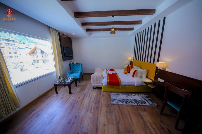Imagen de la habitación del Hotel The Laurent and Banon Resorts. Foto 7