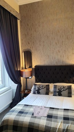 Imagen de la habitación del Hotel The Lauriston. Foto 10