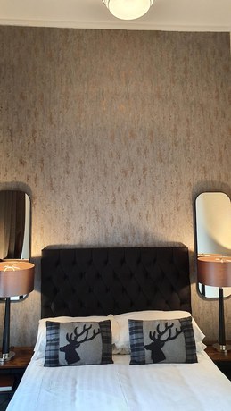 Imagen de la habitación del Hotel The Lauriston. Foto 12