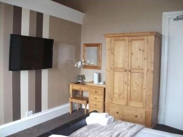 Imagen de la habitación del Hotel The Lauriston. Foto 14