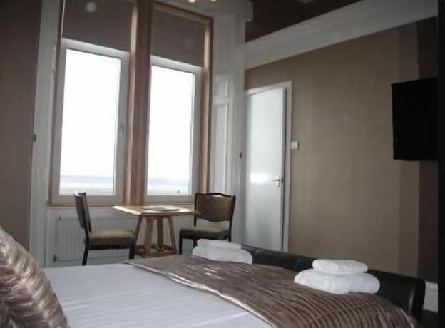 Imagen de la habitación del Hotel The Lauriston. Foto 15