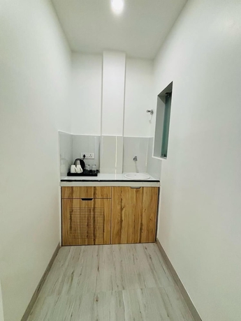 Imagen de la habitación del Hotel The Lavish Stay. Foto 10