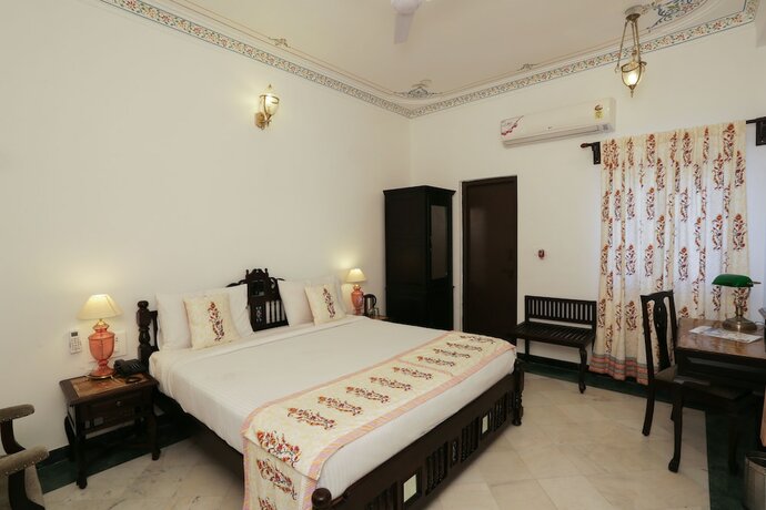 Imagen de la habitación del Hotel The Lavitra Udaipur. Foto 20