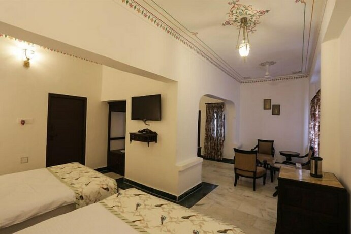 Imagen de la habitación del Hotel The Lavitra Udaipur. Foto 23