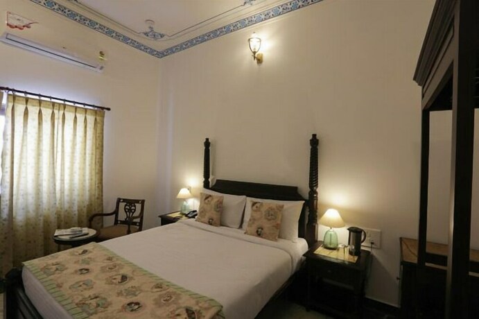 Imagen de la habitación del Hotel The Lavitra Udaipur. Foto 28