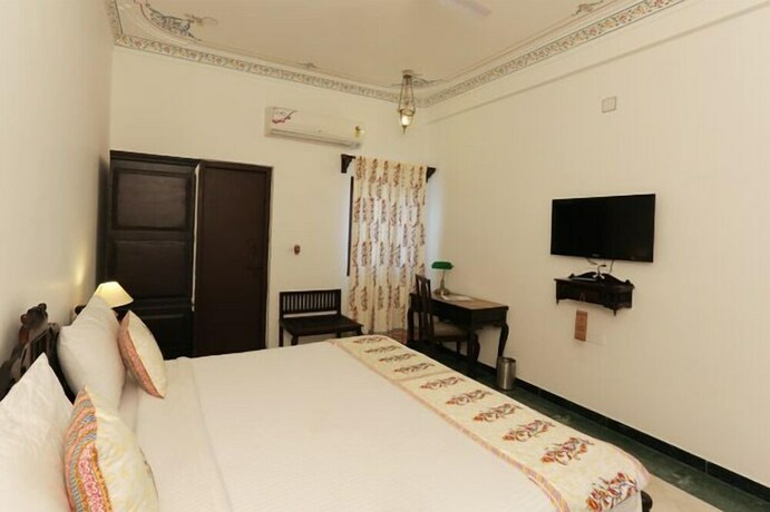 Imagen de la habitación del Hotel The Lavitra Udaipur. Foto 29