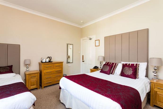 Imagen de la habitación del Hotel The Lawn Guest House. Foto 4