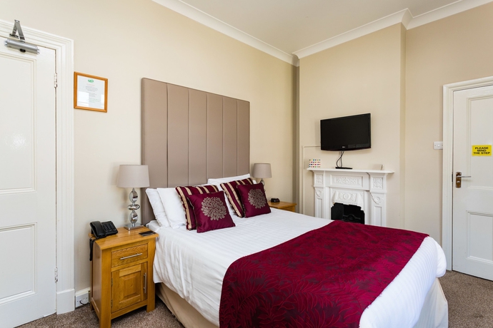 Imagen de la habitación del Hotel The Lawn Guest House. Foto 5