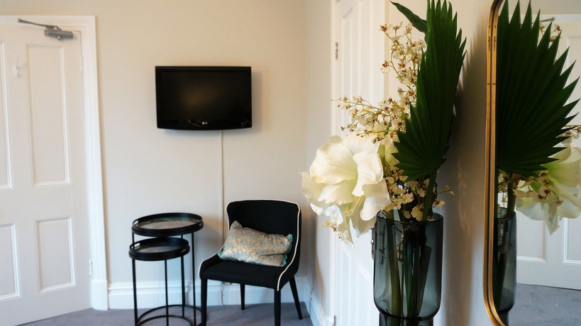 Imagen de la habitación del Hotel The Lawn Guest House. Foto 9