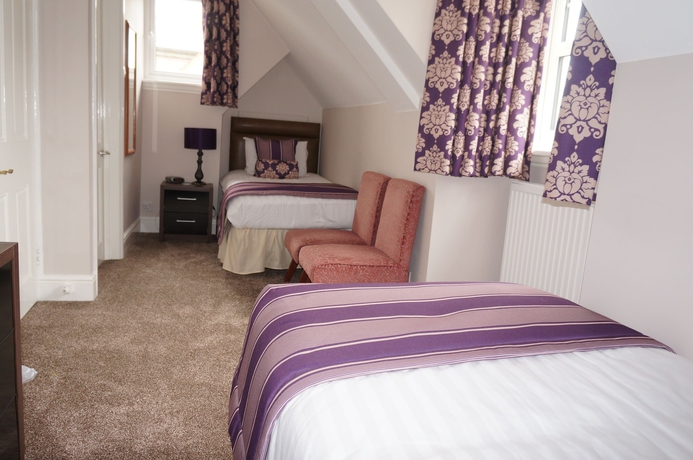 Imagen de la habitación del Hotel The Lawn Guest House. Foto 10