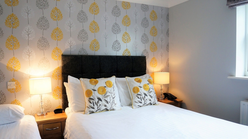 Imagen de la habitación del Hotel The Lawn Guest House. Foto 14