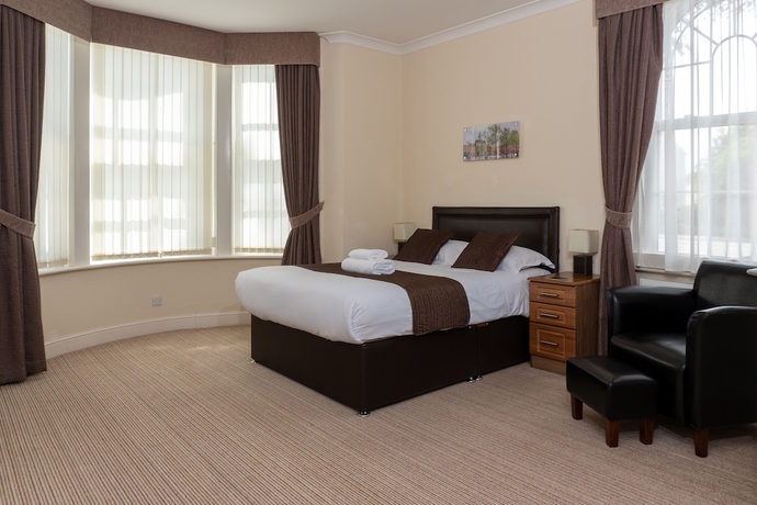 Imagen de la habitación del Hotel The Lawns Guest House. Foto 6