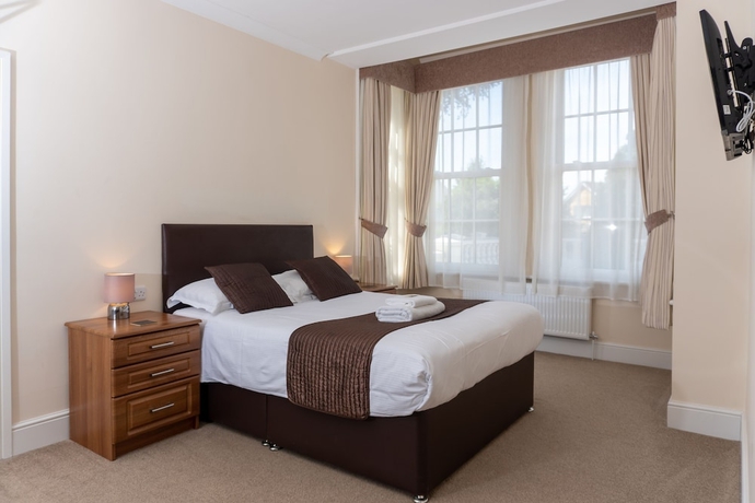 Imagen de la habitación del Hotel The Lawns Guest House. Foto 7