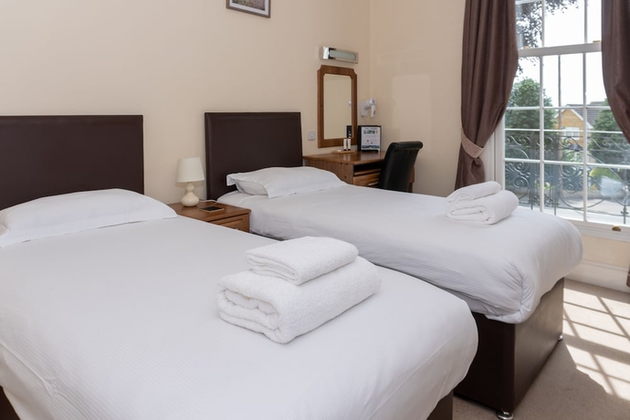 Imagen de la habitación del Hotel The Lawns Guest House. Foto 9
