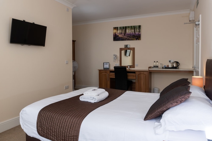 Imagen de la habitación del Hotel The Lawns Guest House. Foto 12