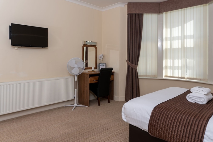 Imagen de la habitación del Hotel The Lawns Guest House. Foto 15