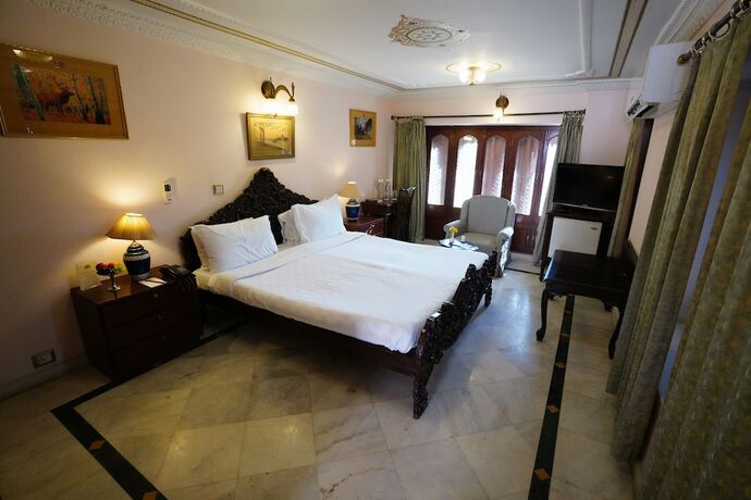 Imagen de la habitación del Hotel The Laxmi Niwas Palace. Foto 15
