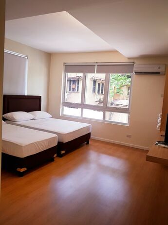 Imagen de la habitación del Hotel The Leaf House. Foto 13