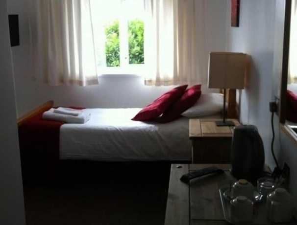 Imagen de la habitación del Hotel The Leaking Well. Foto 11